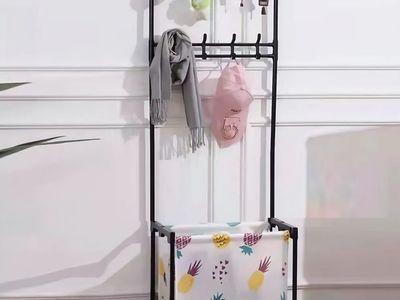 Multi-purpose Organizer Stand with Storage Basket, 8 Clothes Hangers and 4 Wheels